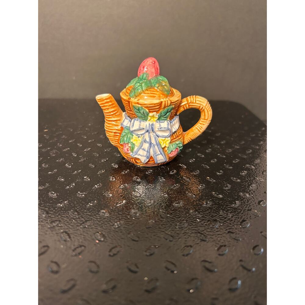 3-inch ceramic miniature teapot features a tan basket weave design